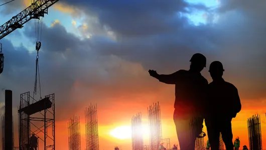 real estate construction site at sunset
