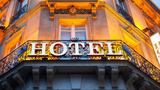an image of a sign that reads HOTEL