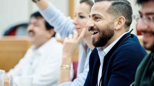 Executive participants engage in classroom discussion.