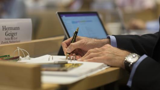 Participant taking notes during a program. 