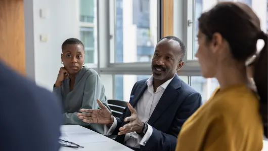 professionals in conference room