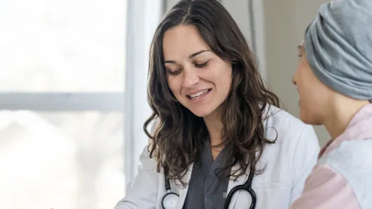 Doctor speaks with patient. 