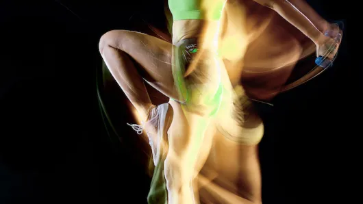 woman excercising with weights.