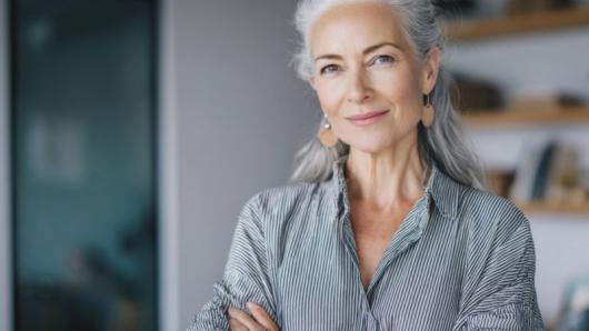 A woman with grey hair.