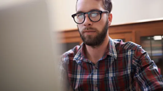 man at computer