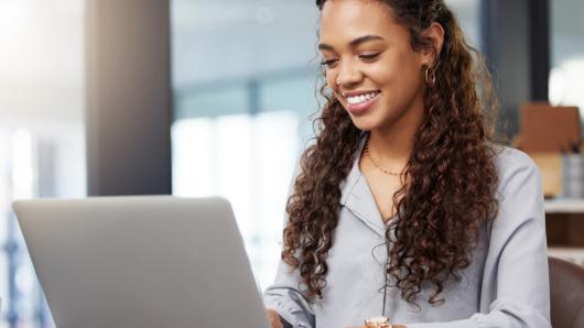 woman looking at computer