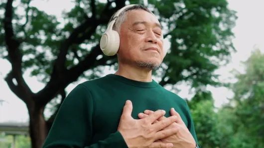 A man meditating.