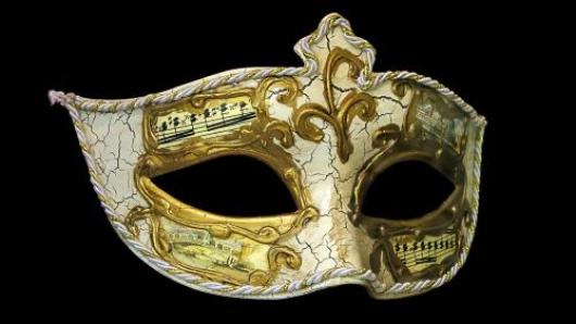 White and gold opera mask
