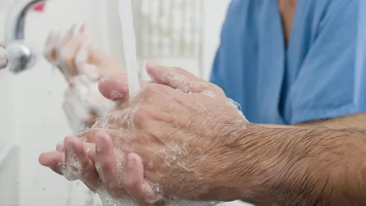 Doctor washing hands.