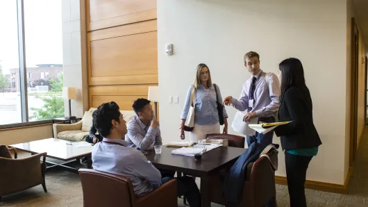 Group discussion around table at Harvard Law School