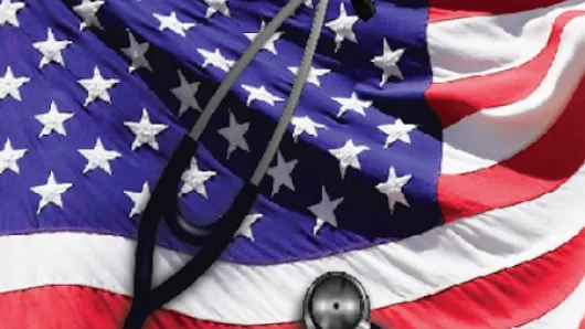 Stethoscope on top of U.S. flag