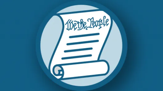 Scroll with "We the People" written at the top