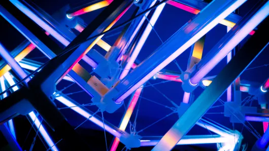 Colorful steel beams and cables intersecting