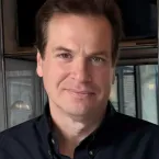 Richard Geruson smiling into the camera